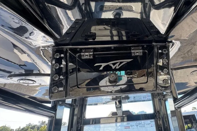 Slide: The Image of Interior view of 2026 Tidewater 232 LXF boat with control console. - 12