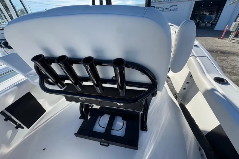Slide: The Image of 2026 Tidewater 232 LXF boat interior with rod holders and seating. - 19