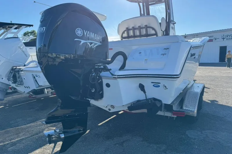 Slide: The Image of 2026 Tidewater 232 LXF boat with Yamaha engine on trailer in marina. - 32