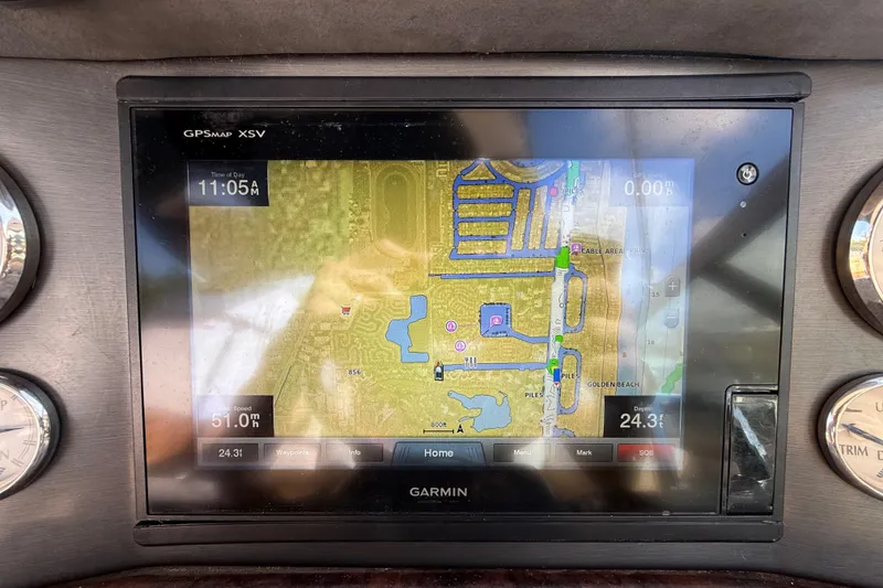 Slide: The Image of Garmin GPS display on 2005 Four Winns 348 Vista boat dashboard, showing map and navigation details. - 37