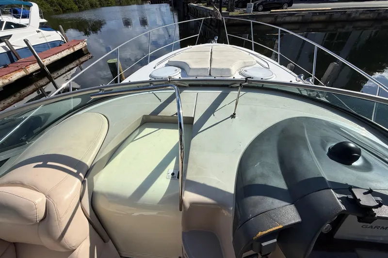 Slide: The Image of 2005 Four Winns 348 Vista boat deck with seating and control panel. - 41