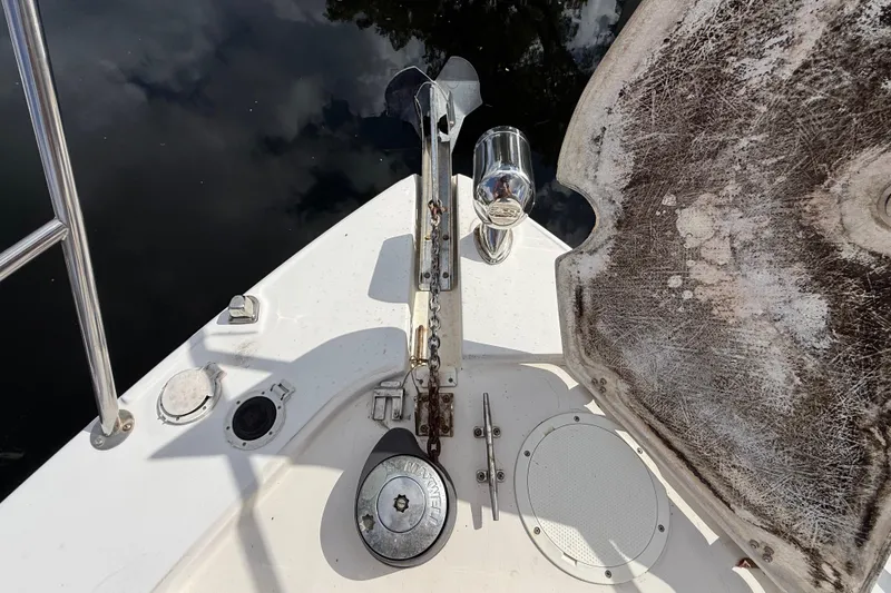 Slide: The Image of 2005 Four Winns 348 Vista boat deck with anchor and hatch details. - 84