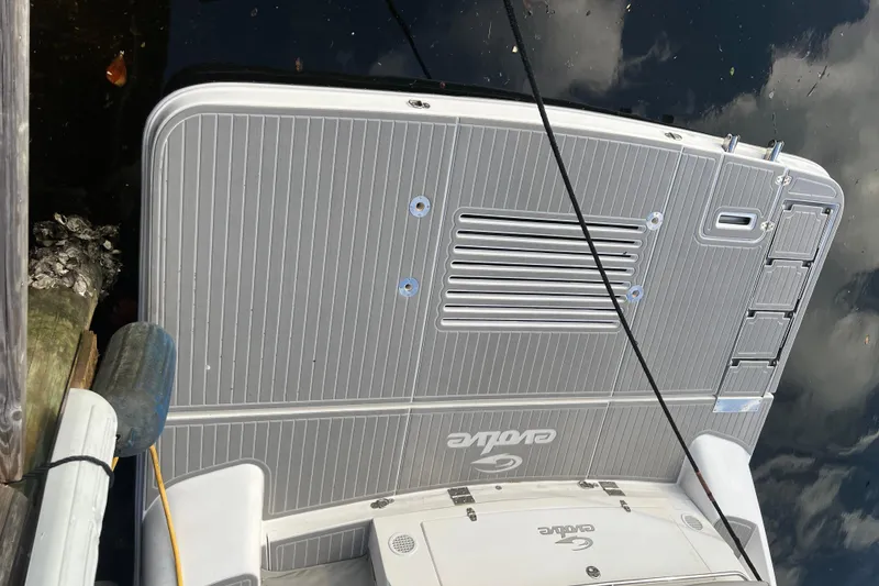 Slide: The Image of Bow of 2021 Evolve 400HT yacht at night, featuring sleek design and modern equipment. - 29