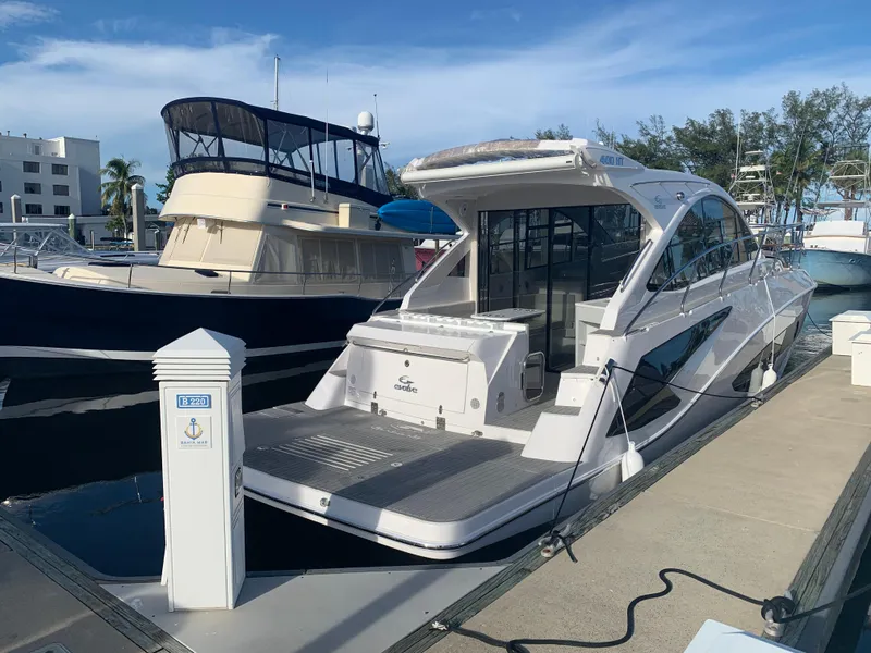 Slide: The Image of Control panel of a 2021 Evolve 400HT boat with digital display and buttons. - 3