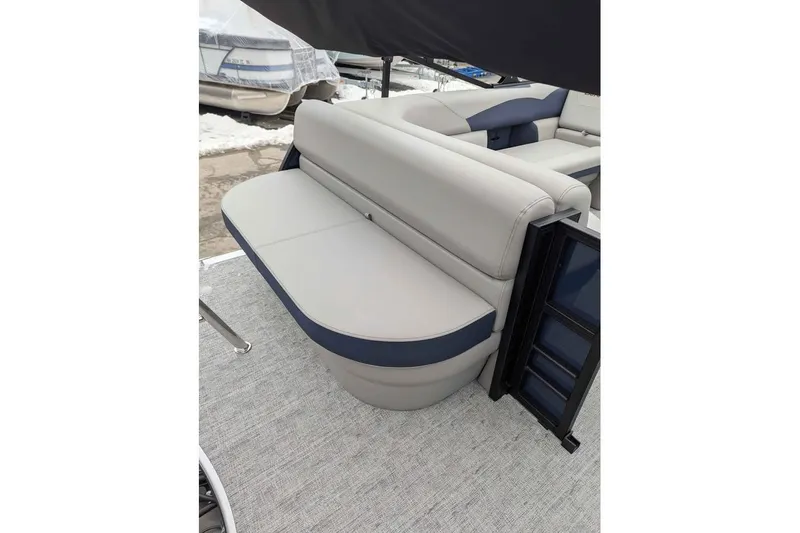 Slide: The Image of 2026 Berkshire 22CL2 LE boat interior with gray and blue seating. - 10