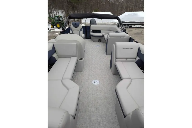 Slide: The Image of Spacious interior of 2026 Berkshire 22CL2 LE pontoon boat with plush seating. - 7