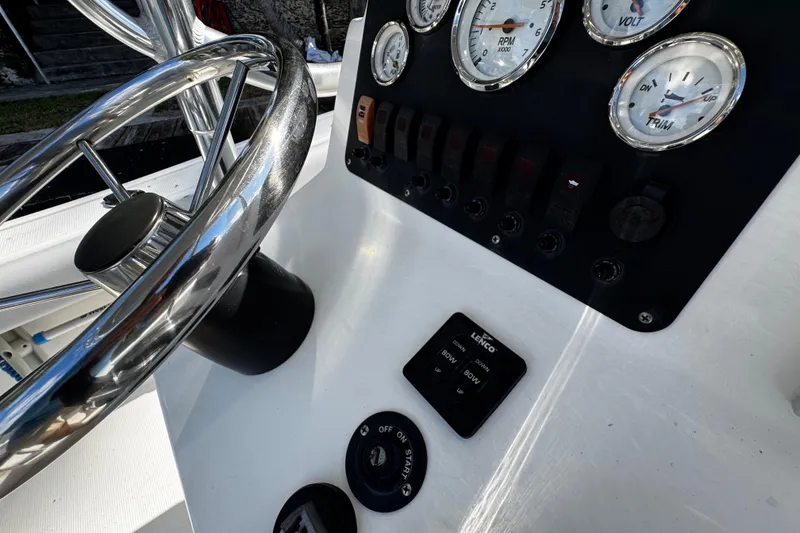 Slide: The Image of Steering wheel and dashboard of 2018 Mako 204 Center Console boat. - 22