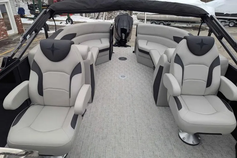 Slide: The Image of 2026 Berkshire 24RFX LE pontoon boat interior with luxurious seating and modern design. - 10