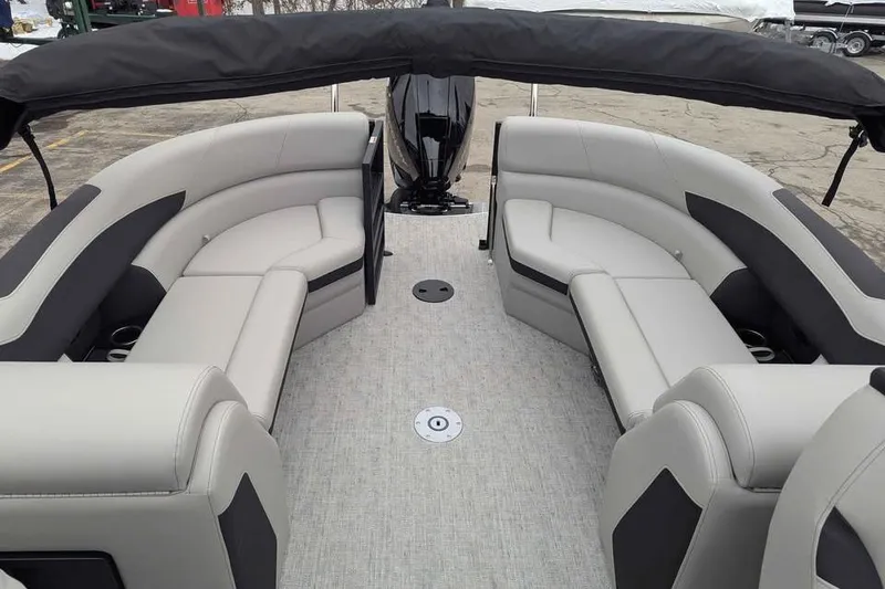 Slide: The Image of 2026 Berkshire 24RFX LE pontoon boat interior with plush seating and modern design. - 12