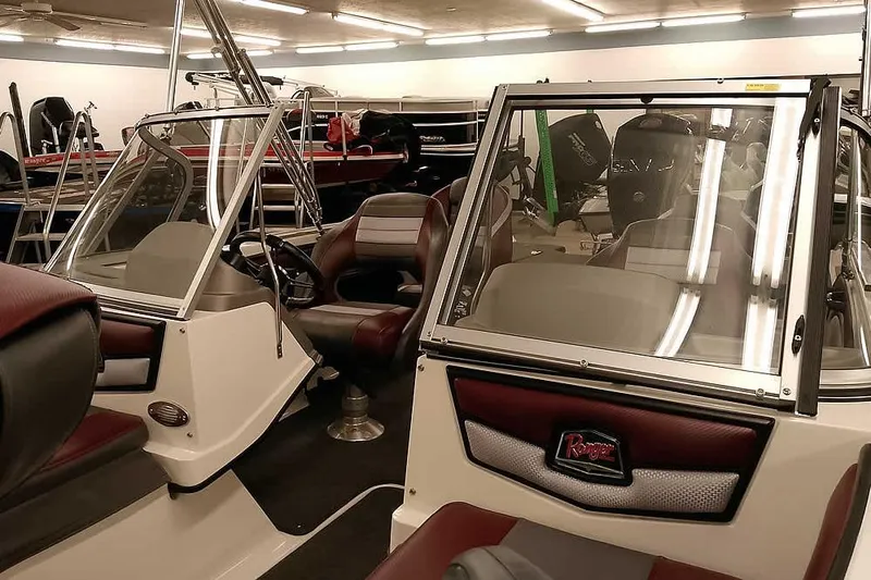 Slide: The Image of 2020 Ranger 1850MS Reata boat interior with seating and steering wheel. - 15