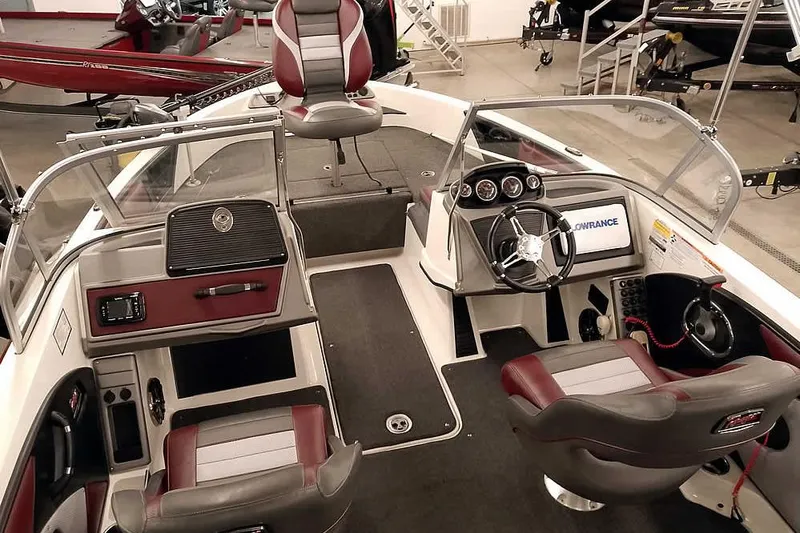 Slide: The Image of 2020 Ranger 1850MS Reata boat interior with steering console and seating. - 20