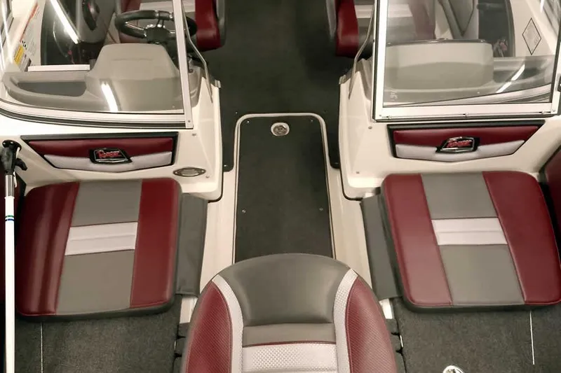 Slide: The Image of 2020 Ranger 1850MS Reata boat interior with red and gray seating. - 22