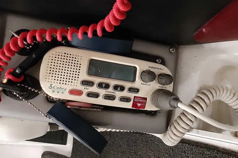 Slide: The Image of Cobra DSC radio on 2020 Ranger 1850MS Reata boat, featuring distress and communication controls. - 41