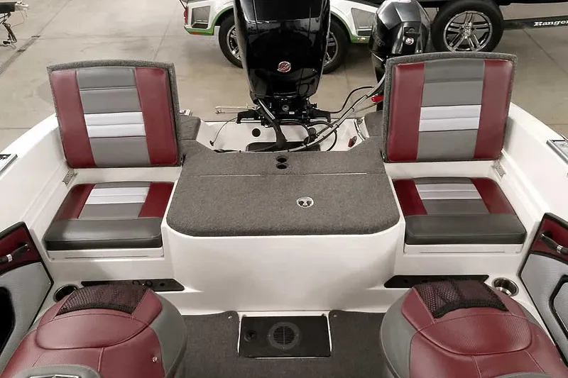 Slide: The Image of 2020 Ranger 1850MS Reata boat interior with red and gray seating. - 47