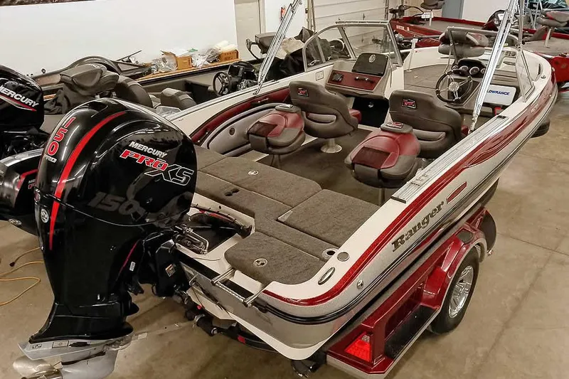 Slide: The Image of 2020 Ranger 1850MS Reata boat with Mercury Pro XS engine in a showroom. - 54