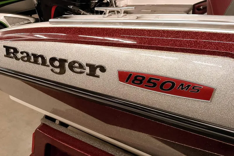 Slide: The Image of 2020 Ranger 1850MS Reata boat with metallic finish and logo detail. - 8