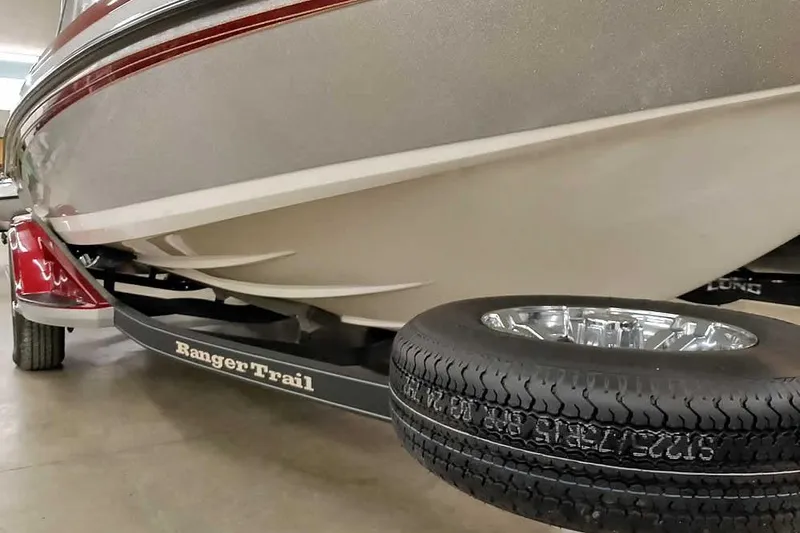 Slide: The Image of 2020 Ranger 1850MS Reata boat on Ranger Trail trailer, close-up view. - 9