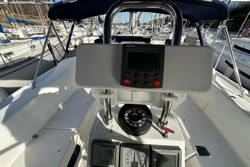 Slide: The Image of Cockpit view of 2003 Catalina 350 sailboat with navigation instruments and compass. - 8