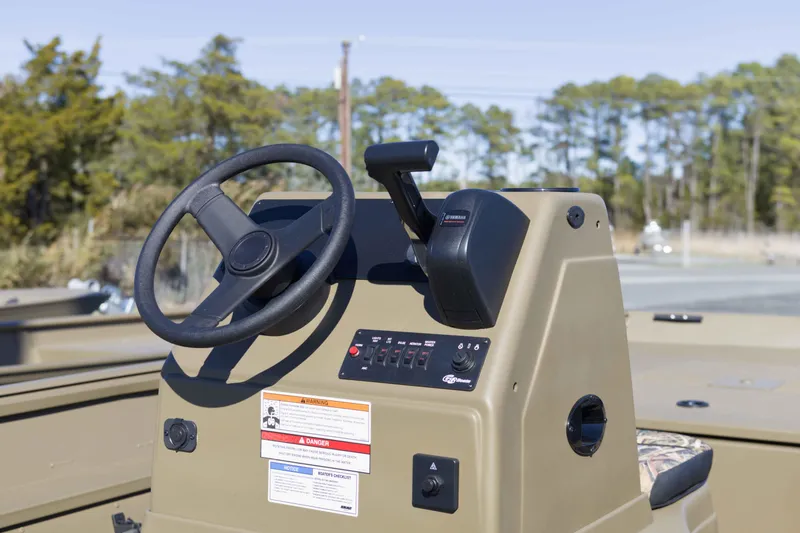 Slide: The Image of 2026 G3 Gator Tough 17 CC boat console with steering wheel and controls. - 9