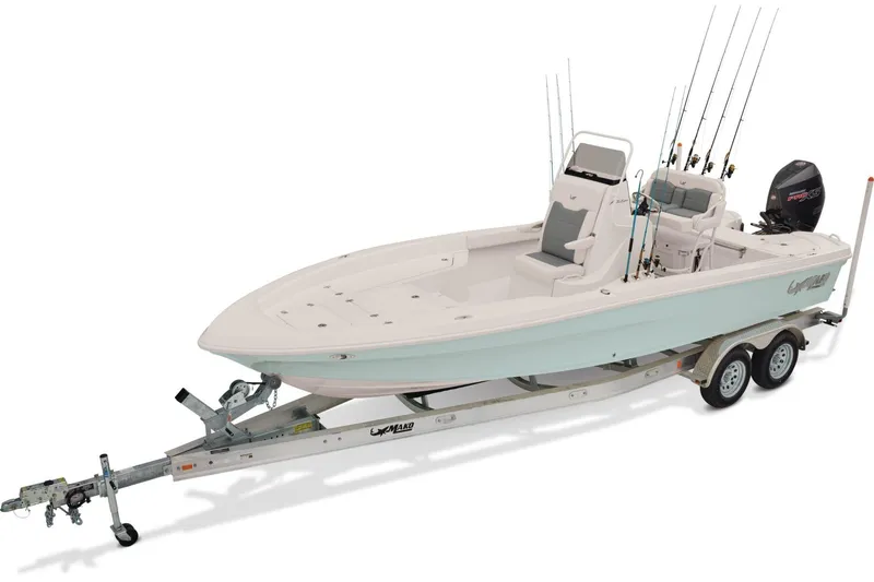 Slide: The Image of 2026 Mako 24 APEX boat on trailer with fishing rods and motor. - 2
