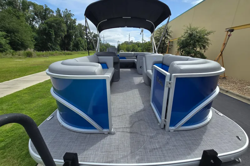 Slide: The Image of 2026 Sun Tracker Party Barge 20 DLX pontoon boat with spacious seating and canopy. - 1