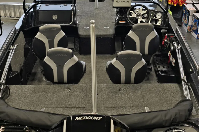 Slide: The Image of 2026 Nitro ZV19 Sport Pro boat interior with four seats and Garmin navigation system. - 66