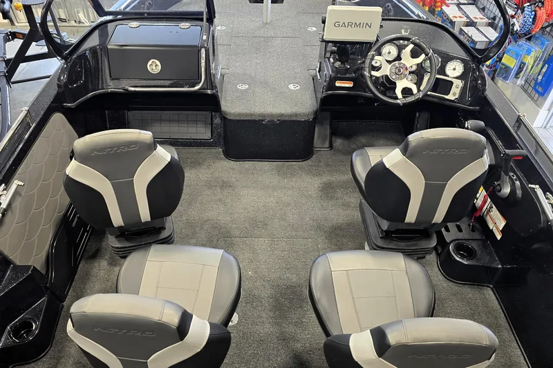 Slide: The Image of Interior of 2026 Nitro ZV19 Sport Pro boat with Garmin navigation system and four seats. - 67