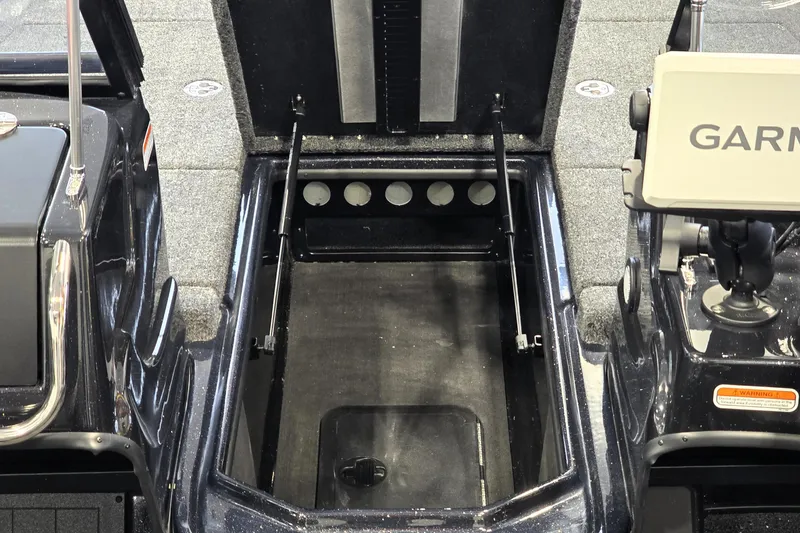 Slide: The Image of Open storage compartment in 2026 Nitro ZV19 Sport Pro boat, featuring Garmin equipment. - 70