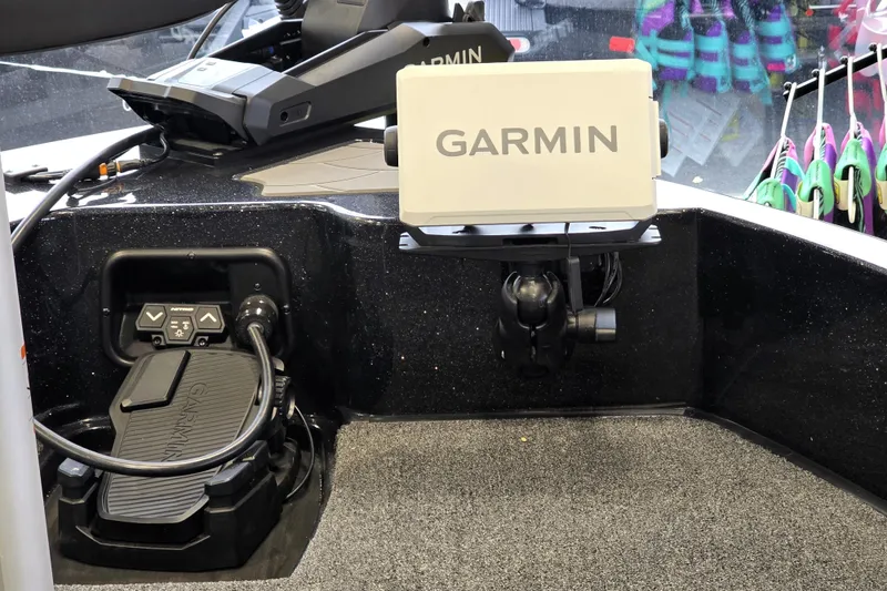 Slide: The Image of 2026 Nitro ZV19 Sport Pro boat with Garmin navigation system and foot pedal controls. - 74