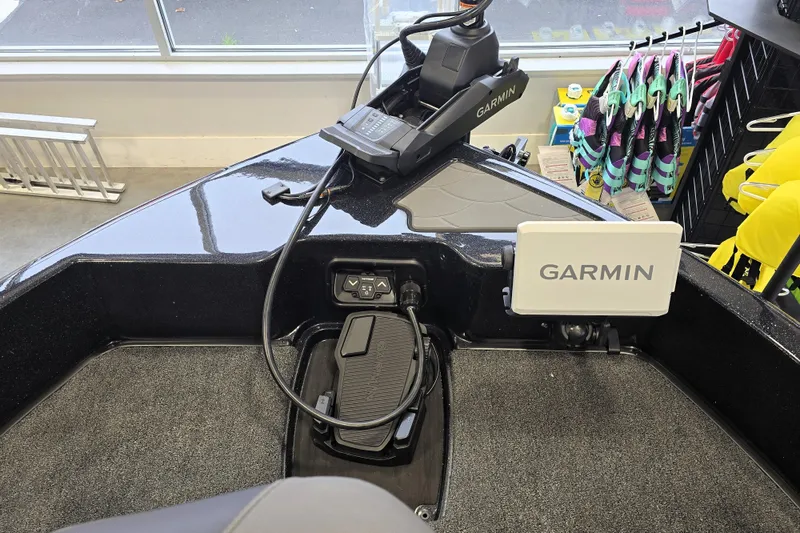 Slide: The Image of 2026 Nitro ZV19 Sport Pro boat with Garmin navigation system in showroom. - 75