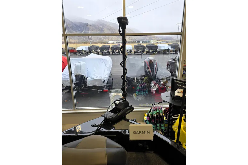 Slide: The Image of 2026 Nitro ZV19 Sport Pro boat interior with Garmin equipment, showroom view. - 77