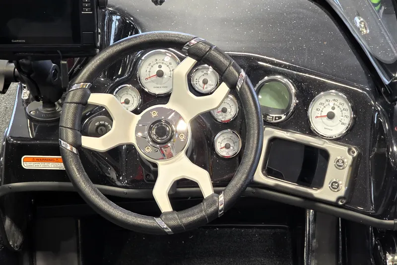 Slide: The Image of Steering wheel and dashboard of 2026 Nitro ZV19 Sport Pro boat, featuring modern gauges. - 80