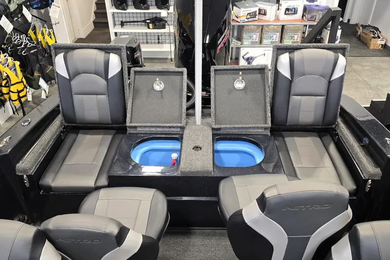 Slide: The Image of 2026 Nitro ZV19 Sport Pro boat interior with seating and storage compartments. - 81