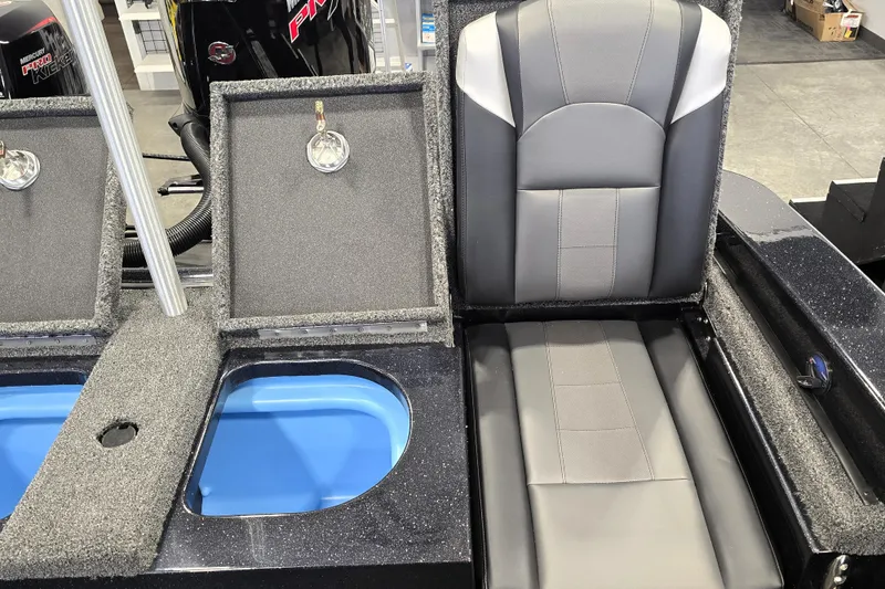 Slide: The Image of 2026 Nitro ZV19 Sport Pro boat interior with seating and storage compartments. - 82