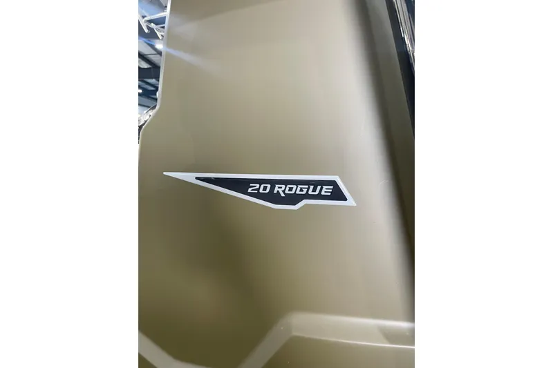 Slide: The Image of 2026 Avid 20 ROGUE CC logo on a sleek, metallic surface. - 11