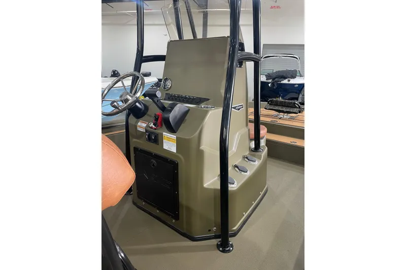 Slide: The Image of 2026 Avid 20 ROGUE CC boat console with steering wheel and controls. - 14