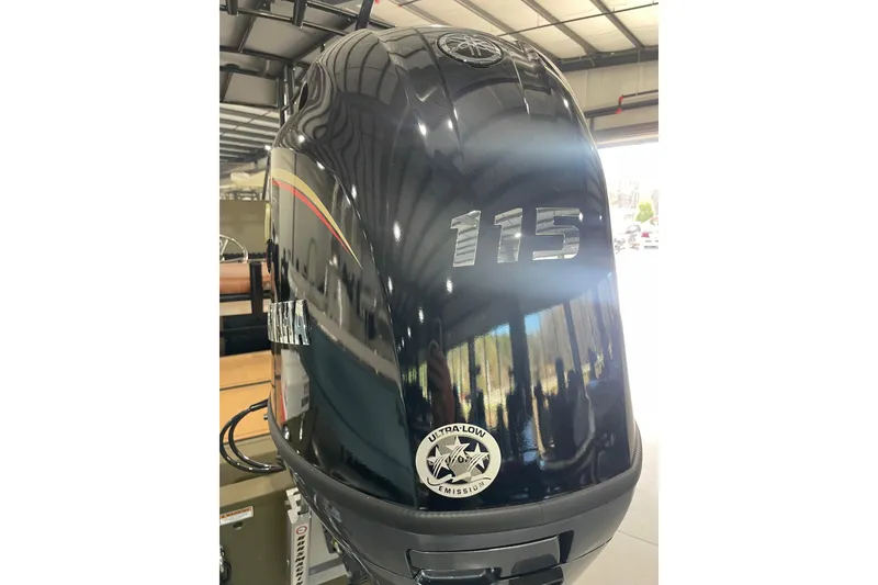 Slide: The Image of Avid 20 ROGUE CC 2026 boat in showroom. - 16