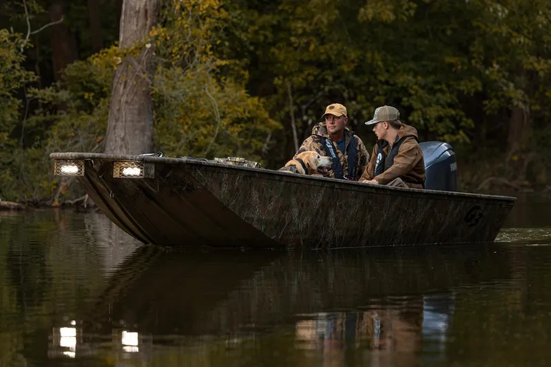 Slide: The Image of 2026 G3 Gator Tough 17 DK boat on trailer in outdoor lot. - 2