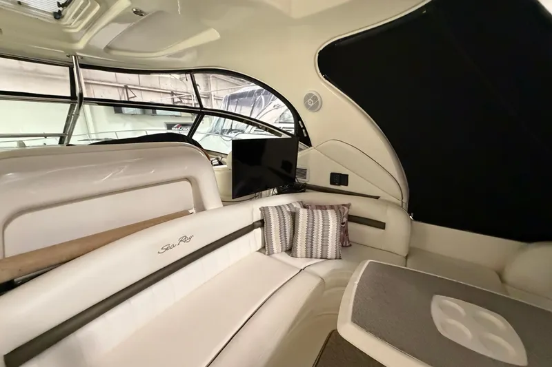Slide: The Image of Interior of 2006 Sea Ray 44 Sundancer yacht with plush seating and modern amenities. - 5