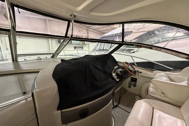 Slide: The Image of Interior view of a 2006 Sea Ray 44 Sundancer yacht cockpit. - 8
