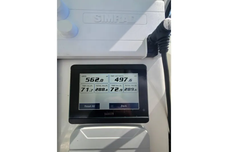 Slide: The Image of Simrad display on 2021 Steiger Craft 31 Miami showing trip data and fuel usage. - 5