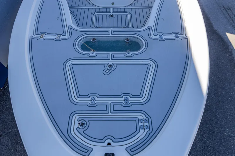 Slide: The Image of 2017 Sea Pro 248 Bay boat deck with detailed non-slip surface design. - 10