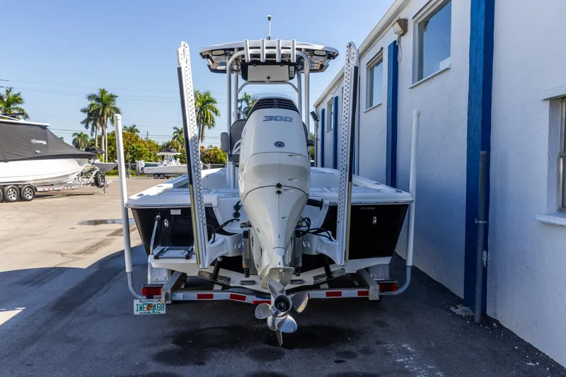 Slide: The Image of 2017 Sea Pro 248 Bay boat with powerful outboard motor, parked outdoors. - 4