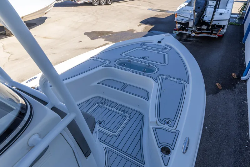 Slide: The Image of 2017 Sea Pro 248 Bay boat deck, featuring sleek design and modern fittings. - 8