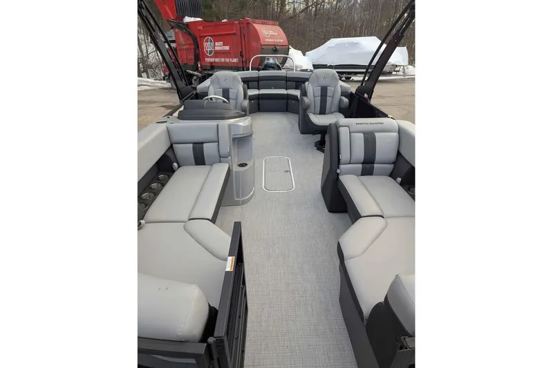 Slide: The Image of 2026 Berkshire 24RFX CTS pontoon boat with spacious seating and modern design. - 6