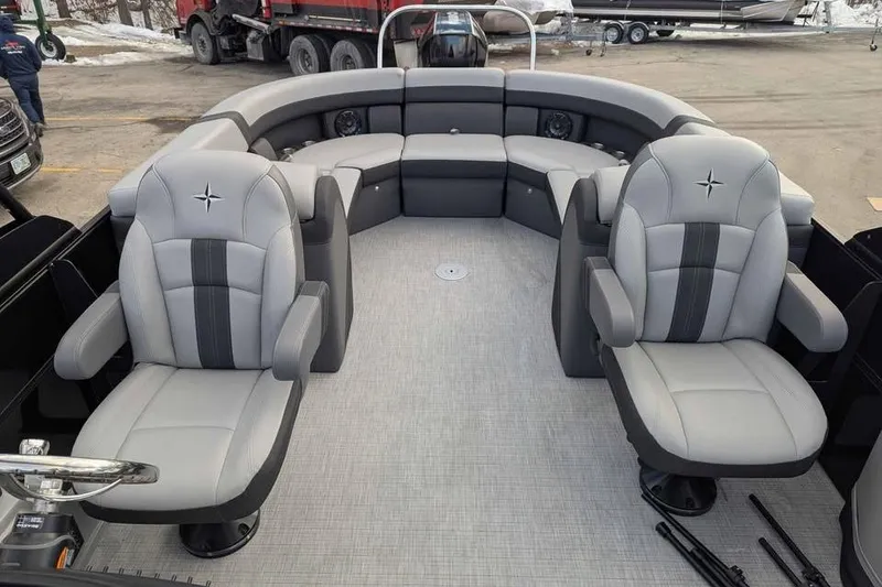 Slide: The Image of 2026 Berkshire 24RFX CTS pontoon boat interior with luxurious seating and modern design. - 8