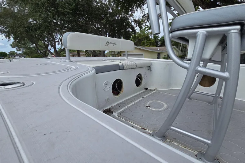 Slide: The Image of 2007 Yellowfin 24 Bay boat interior with seating and deck details. - 12