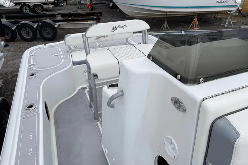 Slide: The Image of 2007 Yellowfin 24 Bay boat interior with seating and console details. - 9