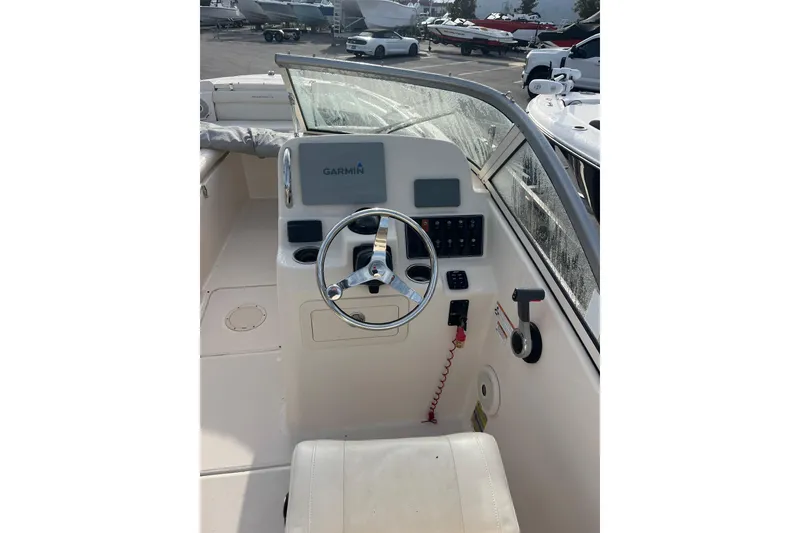 Slide: The Image of 2018 Grady-White Freedom 215 boat helm with Garmin navigation system. - 6