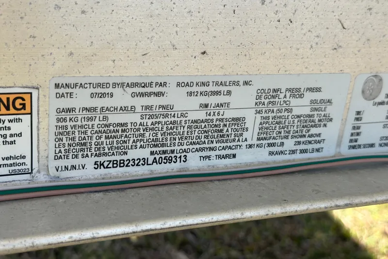 Slide: The Image of Label on Road King Trailers, Inc. with specifications for Bay Rider 239 Bay, 2020 model. - 10